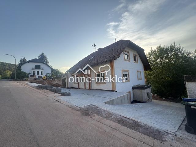 Einfamilienhaus mit unverbaubarem Blick und Einliegerwohnung
