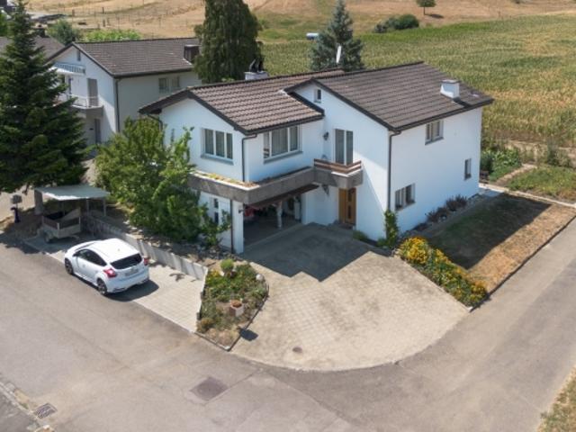 Einfamilienhaus mit wunderschönem Garten, direkt angrenzend an die Landwirtschaftzone