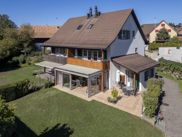 Einfamilienhaus mit wunderschönem Garten