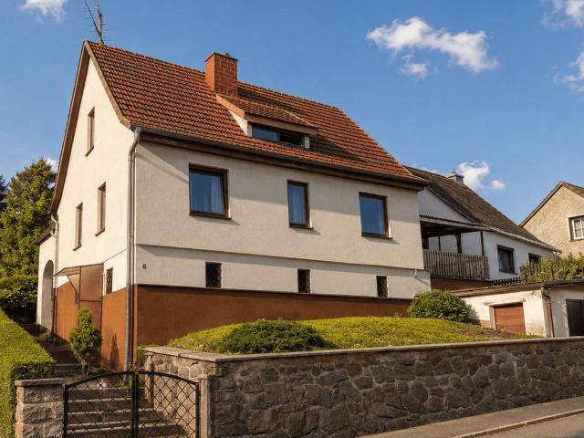 Einfamilienhaus mit Weitblick, Doppelgarage, Terrasse und vielseitigem Entwicklungspotenzial