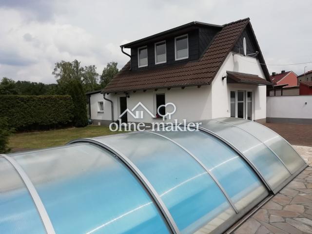 Einfamilienhaus plus Ferienhäuschen
