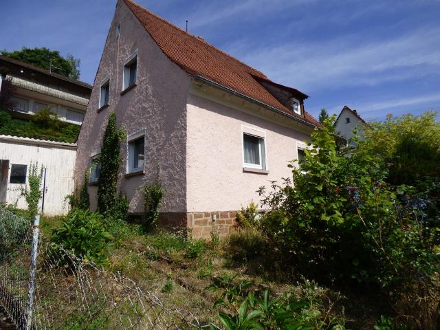 Einfaches Siedlungshaus mit großem Garten