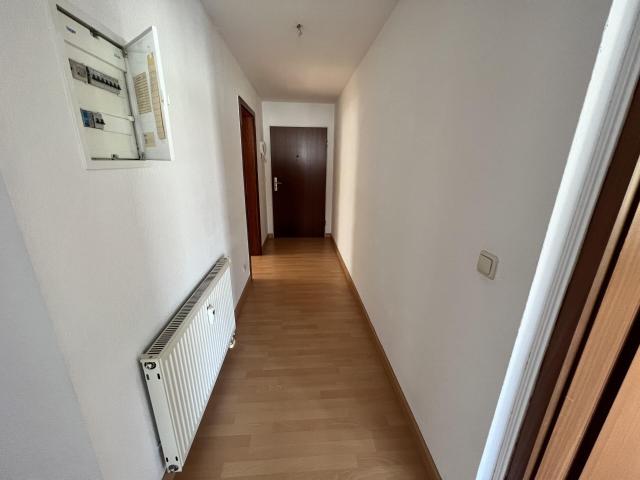 Einmaliger Ausblick | Vermietete 3 Zimmerwohnung mit Balkon nahe Zwickau zum Kauf