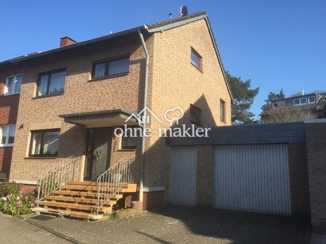 Einseitig angebautes EFH mit unterkellerter Garage