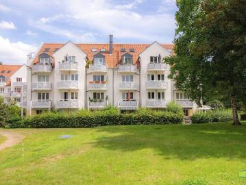 Etagenwohnung kaufen in Oberholz, Großpösna - Garten