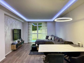 EIGENGARTEN: Moderne 2 Zimmerwohnung mit Tiefgaragenparkplatz