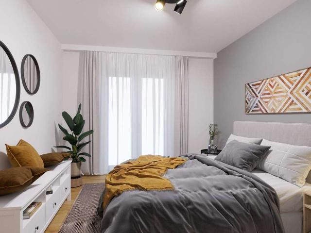 Eigentumswohnung mit großem hellen Wohnbereich, zwei Bädern und Balkon