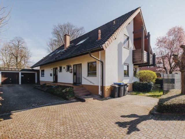 Eigentumswohnung im Charakter einer Doppelhaushälfte mit Garten in Umkirch