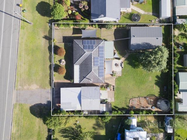 Eight Car Shedding, Updated Home and a 1,214m² Double Block