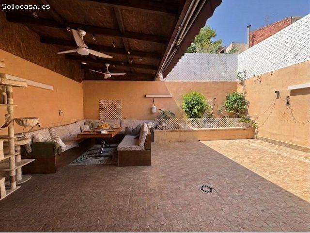 EL ENCANTO DE UN CHALET EN PLENA CIUDAD
