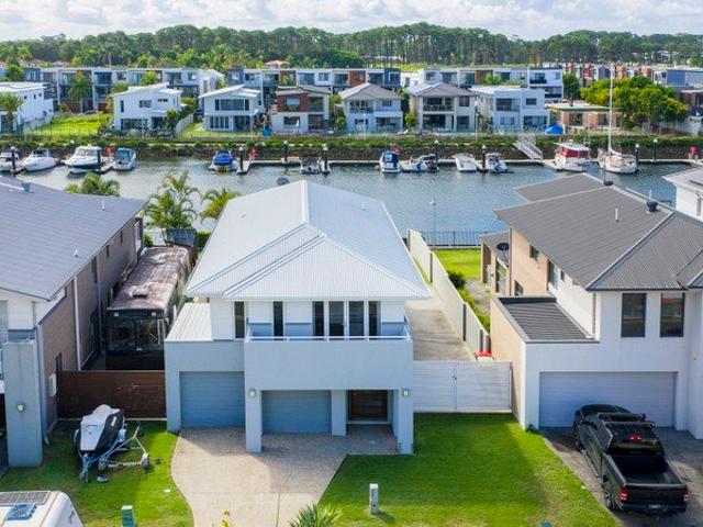 Elevate Your Lifestyle: A North Facing Waterfront Masterpiece with Private Marina Berth and Unrestricted Ocean Access