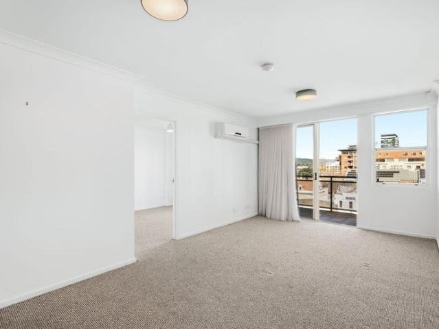 Elevate your lifestyle with this stylish two bedroom unit offering breathtaking city views
