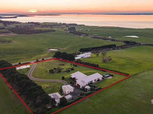 Elevated 4 acres with Breathtaking Bay Views