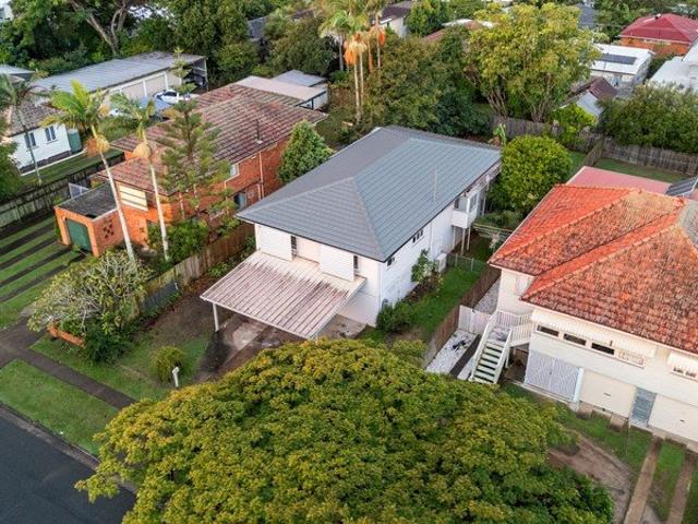 Elevated 4 Bedroom Home with Bay Glimpses and Exciting Future Potential