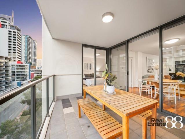 Elevated 7th Floor Living with River Glimpses