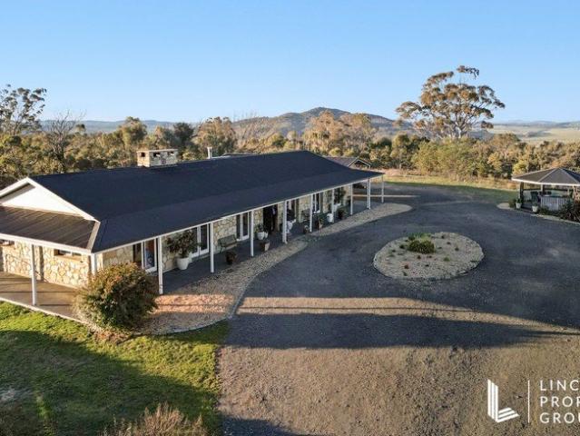 Elevated 20 Acre Retreat with Panoramic Views, Railway Carriage Accommodation & Massive Workshop