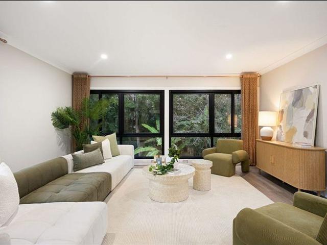 Elevated 3 Bedroom Family Home with Courtyard in Indooroopilly