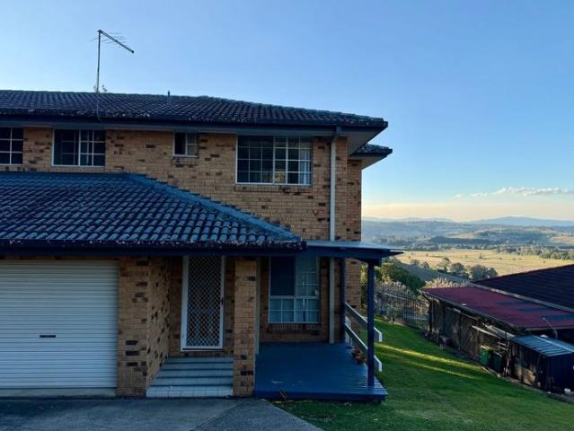 Elevated 3 Bedroom Unit in a Sought After Location