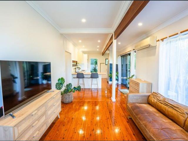Elevated Three Bedroom Home Moments from the Beach
