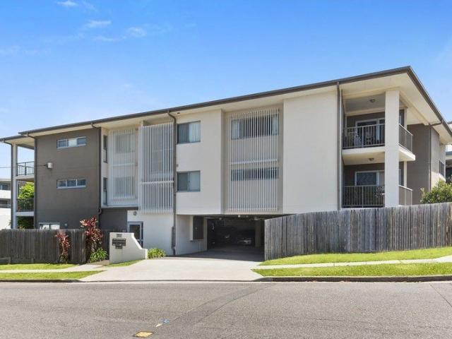 Elevated Top Floor Living in an Exceptionally Convenient Location