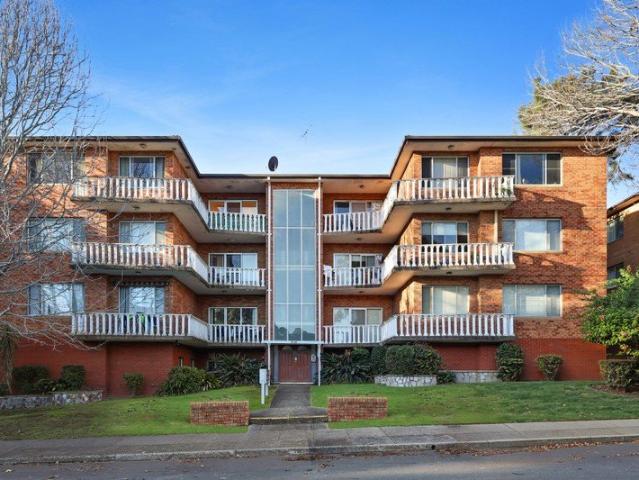 Elevated Top Floor Living with District Views & Unmatched Convenience