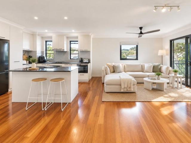 Elevated Top Floor Living with Dual Balconies, Two Car Accommodation & Resort Style Pool