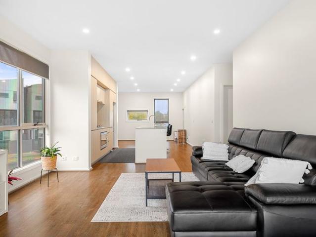 Elevated Townhouse Living with Wetland Views!