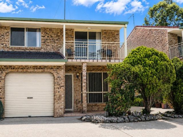 Elevated Townhouse with Leafy Views & Low Maintenance Appeal