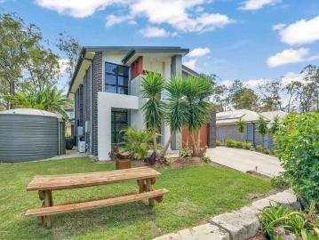 Elevated Tranquillity: Stylish Living with a Water View