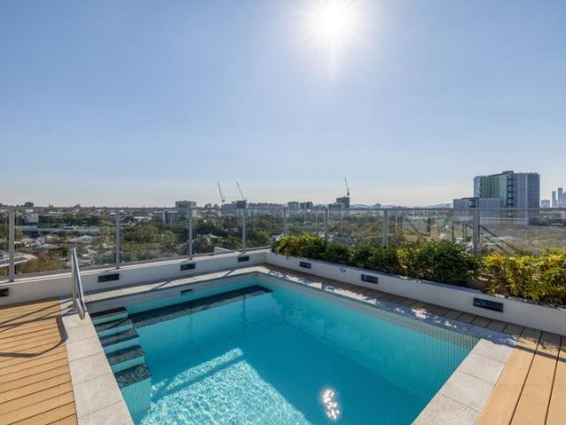 Elevated Two Bedroom Apartment with Two Balconies & Rooftop Pool