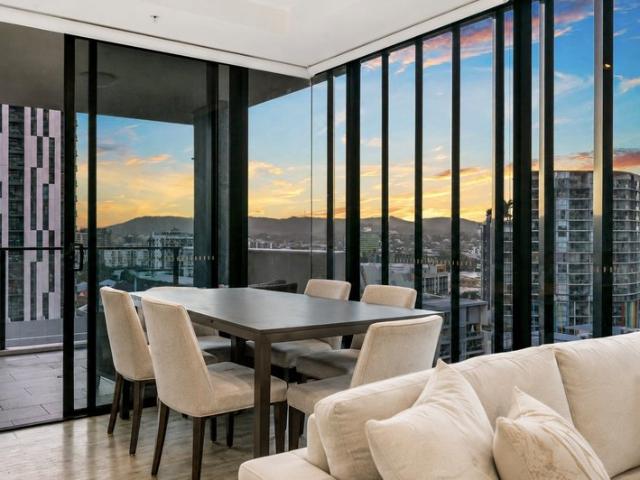 Elevated Two Bedroom Living with Sweeping Sunset Views!