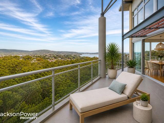 Elevated Two Storey Penthouse with Reserve & Water Outlooks