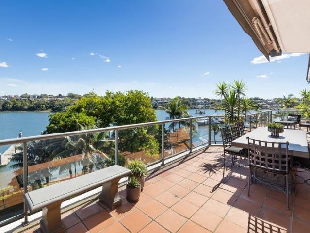 ELEVATED WATERFRONT LIVING WITH PRIVATE MARINA BERTH
