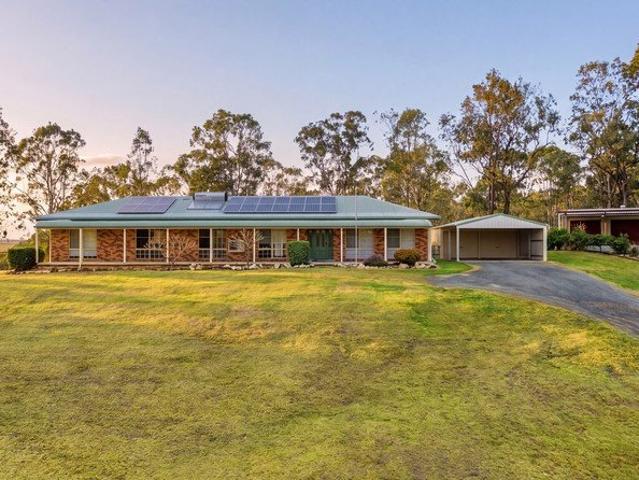 ELEVATED ACREAGE HAVEN WITH PANORAMIC MOUNTAIN VIEWS