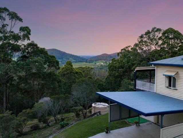 Elevated Acreage Living with Character, Views and Complete Privacy