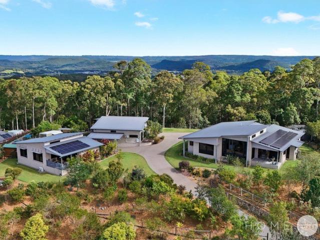 Elevated Acreage Living with Sweeping Coastal Views & Genuine Dual Living
