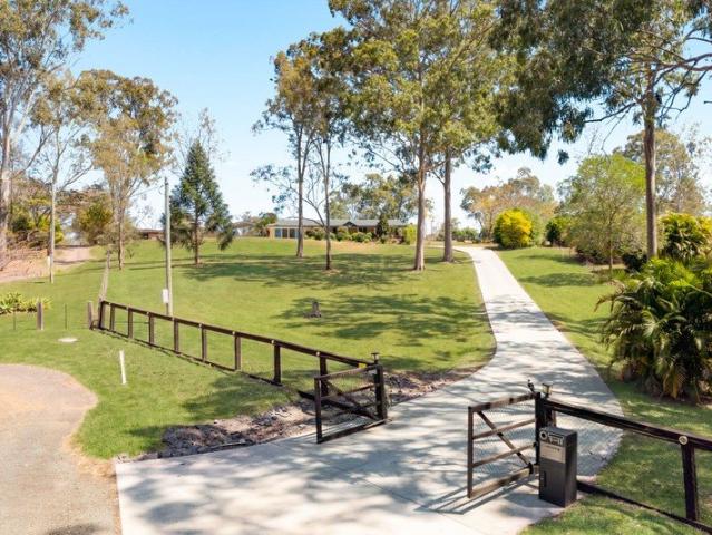 Elevated Acreage Living with Space, Privacy and Exceptional Infrastructure
