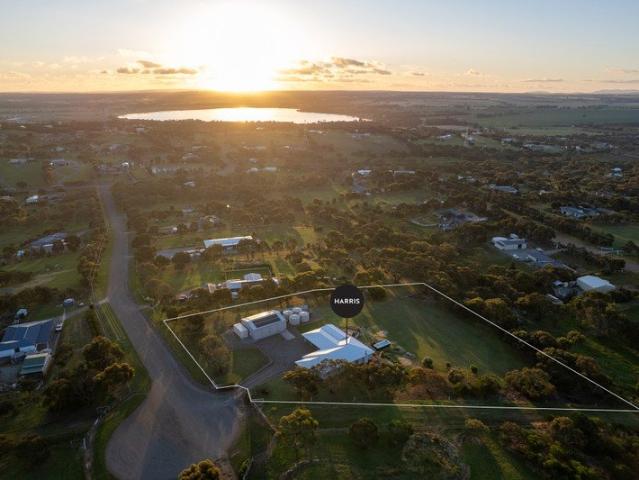 Elevated acreage living with unrivalled views and modern comfort.