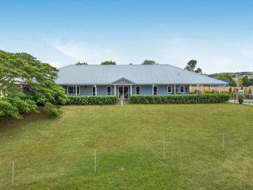 Elevated Acreage Living with Views, Pool & Timeless Elegance