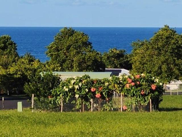 Elevated Acreage with Ocean & Mountain Views