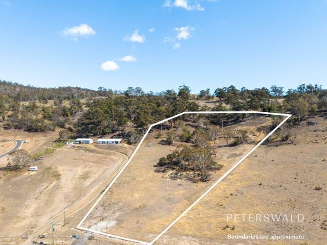 Elevated acreage with sweeping valley and water views