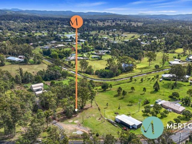 Elevated Acreage with Views & Natural Beauty
