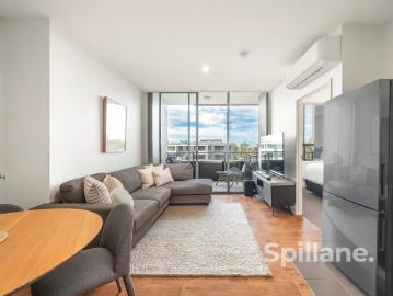 Elevated Apartment Living with Ocean Glimpses