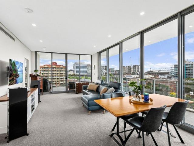 Elevated Apartment Living with Sweeping Coastal Views