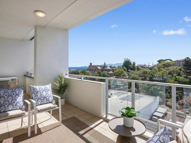 Elevated apartment with generous patio