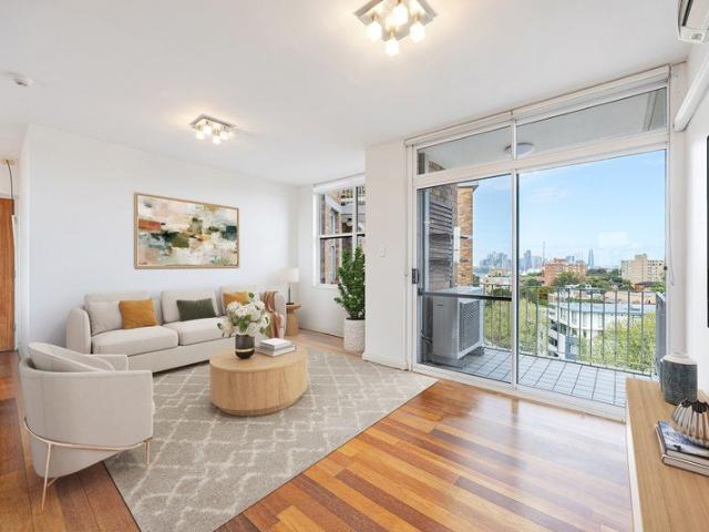 Elevated Apartment with Harbour and City Skyline Views