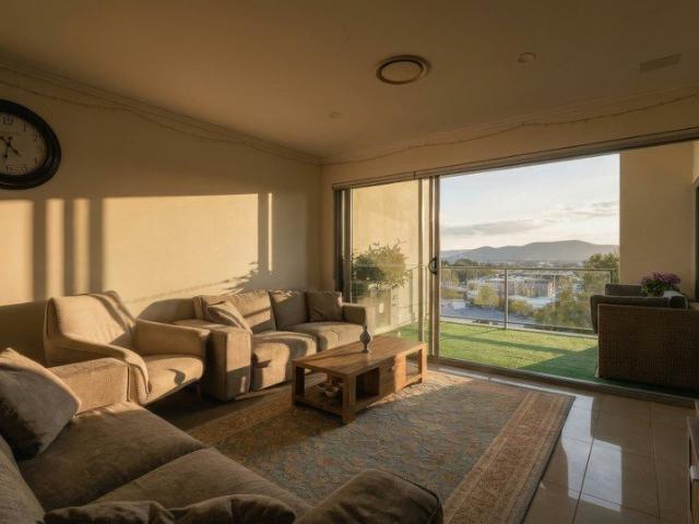 Elevated Apartment with Park & Mountain Views