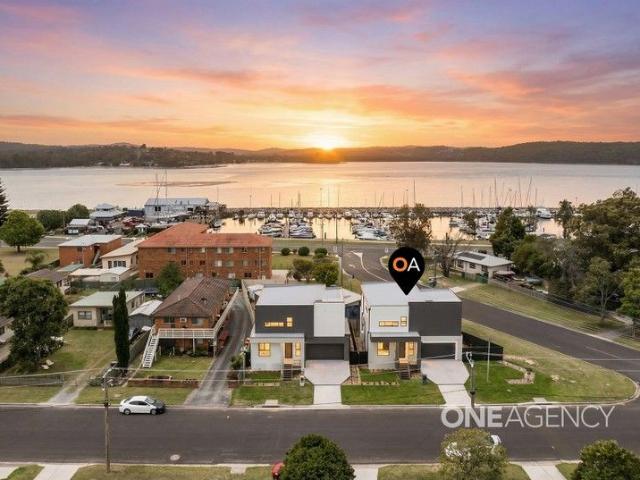 ELEVATED BAYFRONT LIVING WHERE LUXURY MEETS THE HORIZON