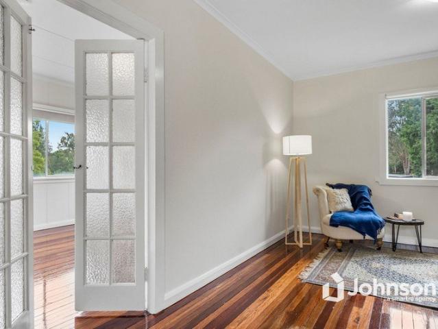 ELEVATED BAYSIDE ACREAGE WITH CHARACTER CHARM
