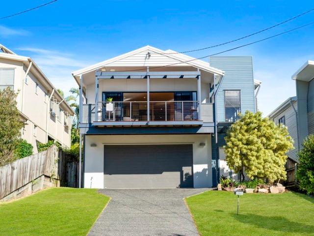 Elevated Bayside Living with Space for the Whole Family!